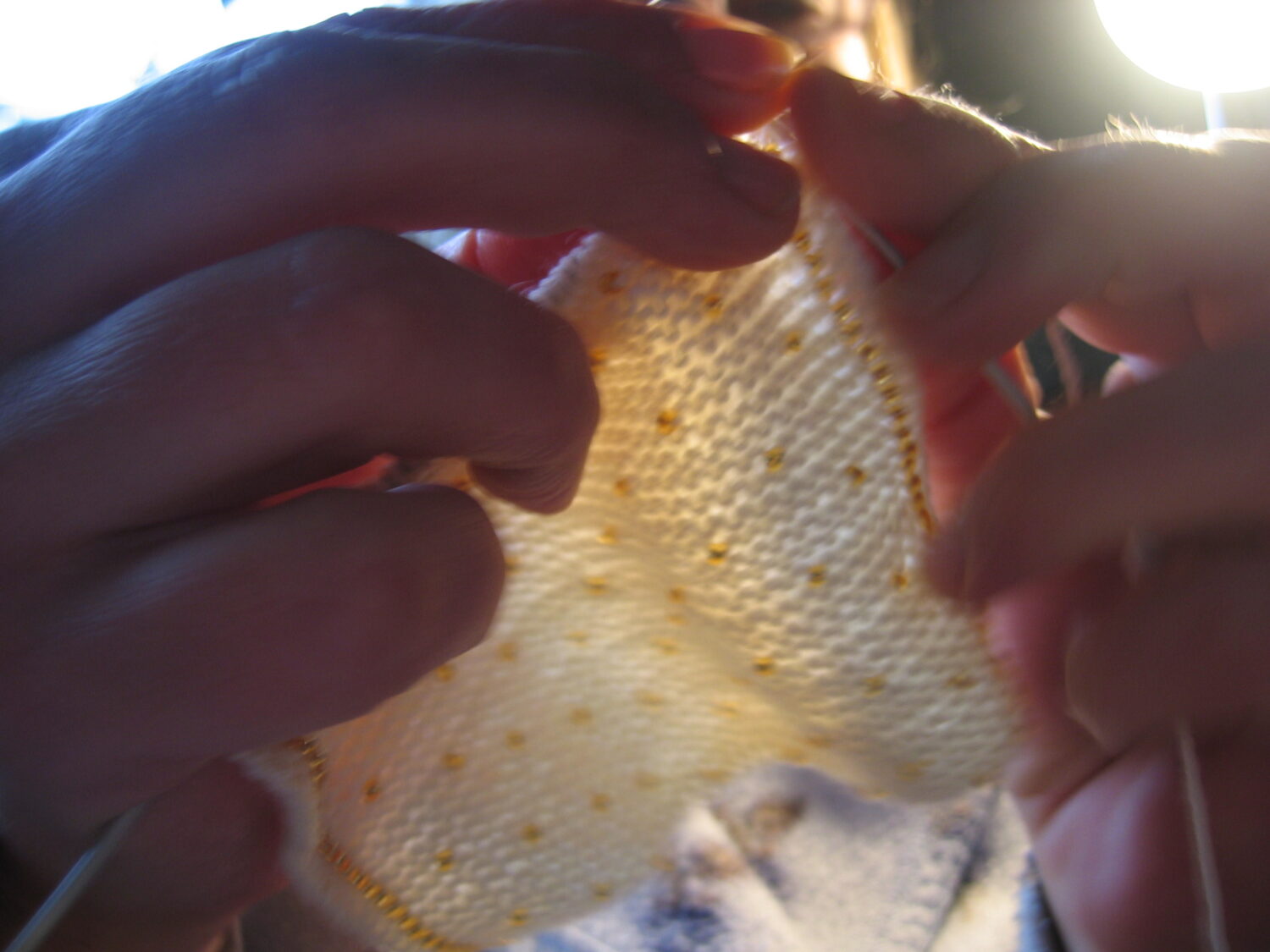 Mom knitting wrist warmers with little beads 2005 (Photo copyright Hanna Andersson)