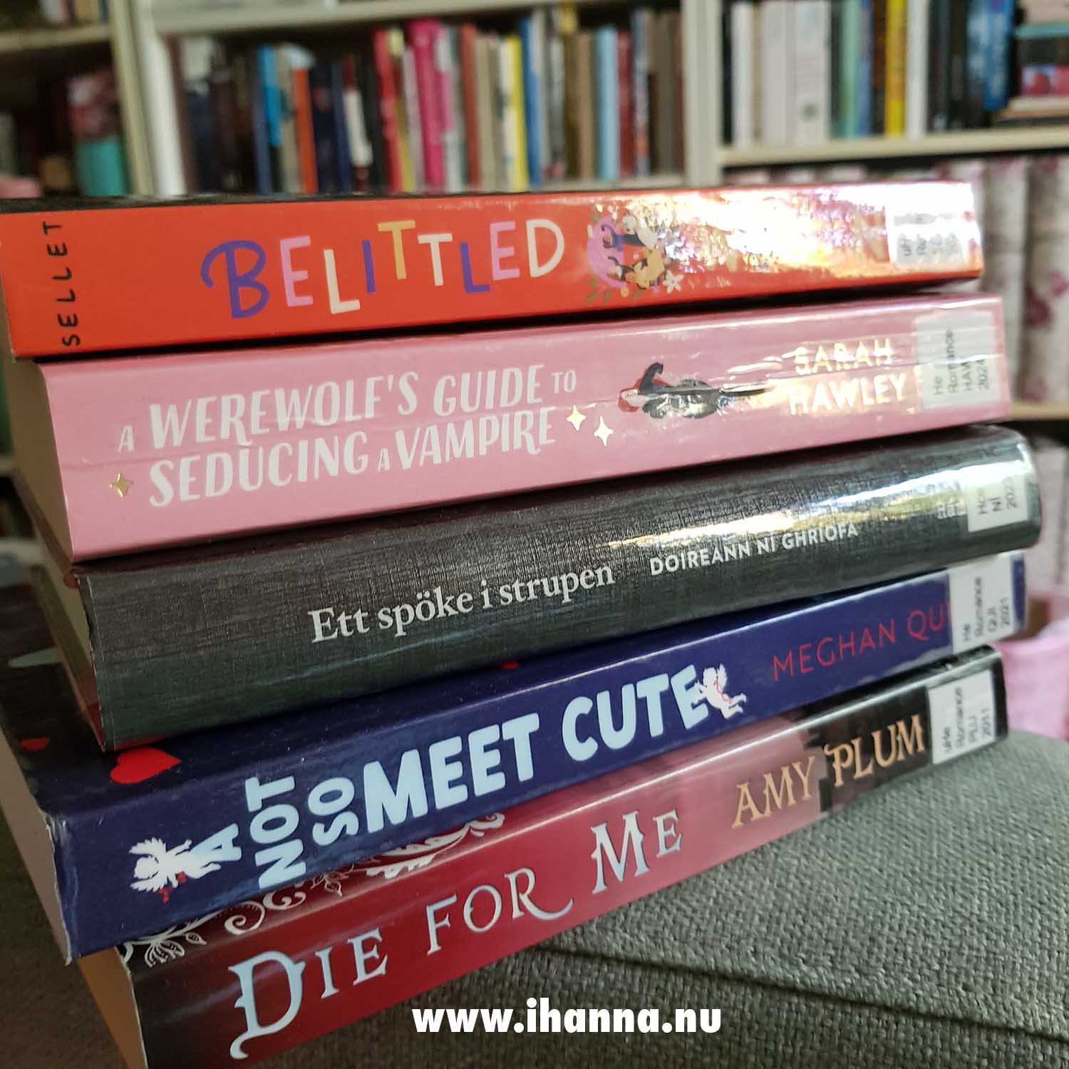 Library book pile of romance and YA (Photo copyright Hanna Andersson)