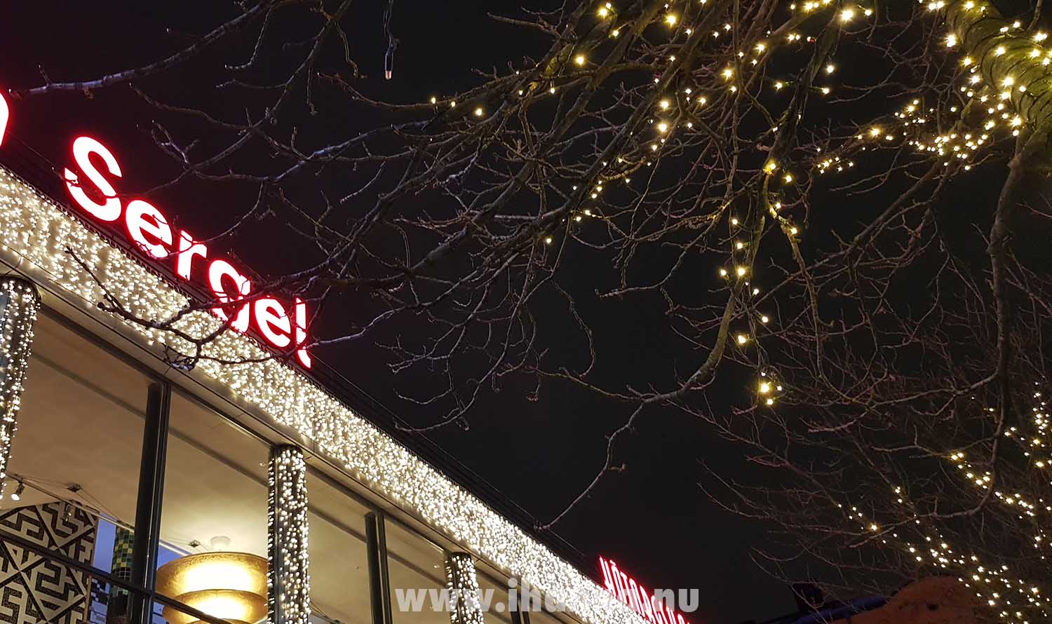Street photography in Stockholm at night twinkling lights by the cinema (Photo Copyright Hanna Andersson)