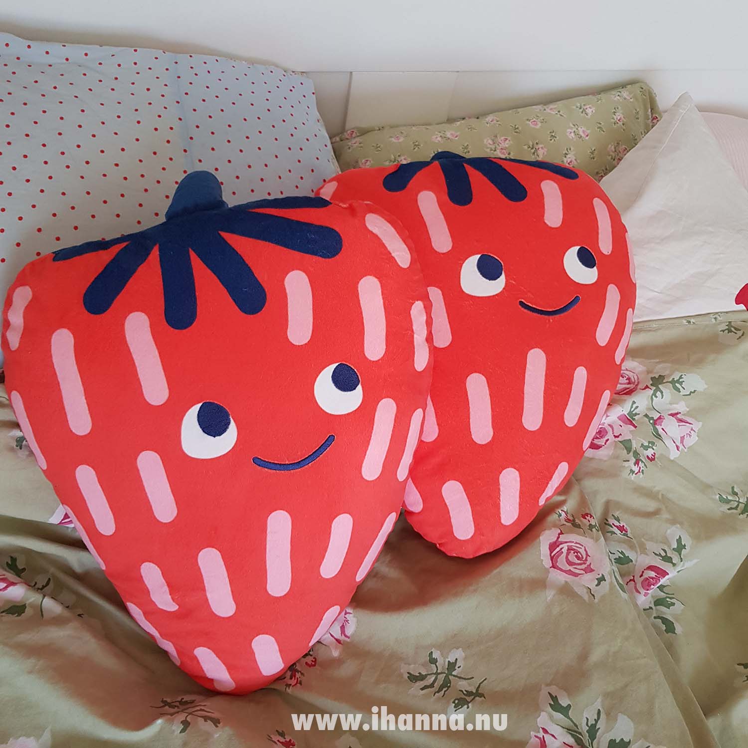 Strawberry pillows on my bed are the cutest pair ever (Copyright Hanna Andersson)