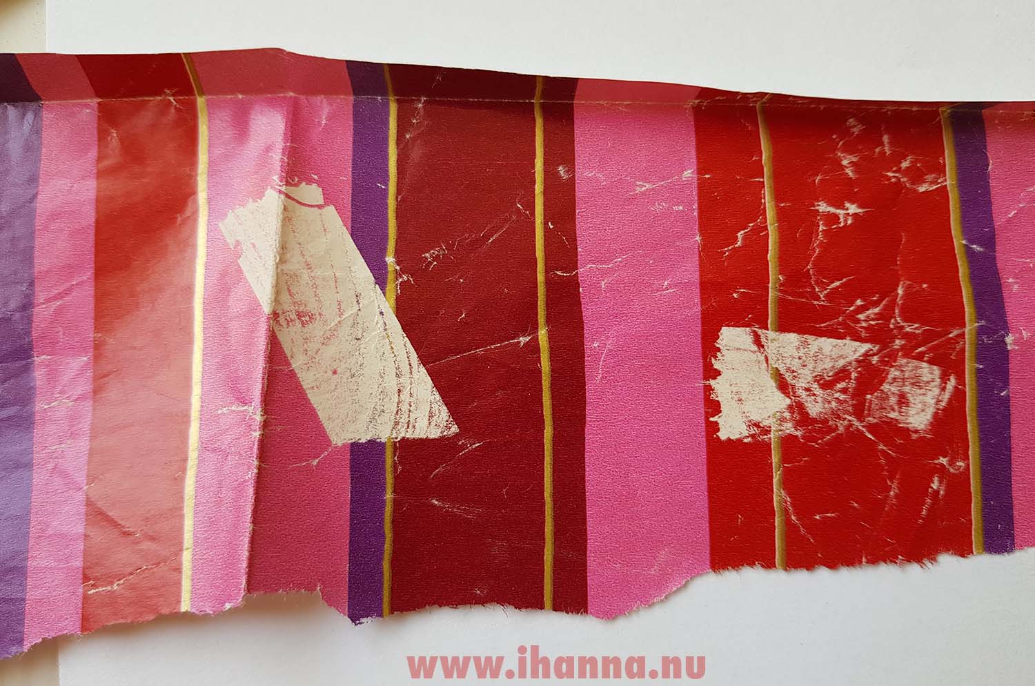 Paper scrap used wrapping paper with tape marks ready to be part of the anatomy of a collage (Copyright H. Andersson)