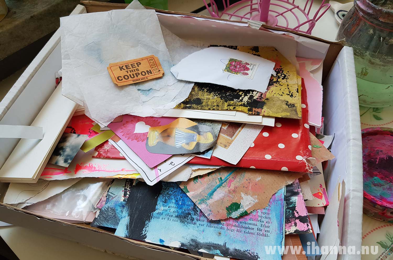 Scrap inbox on my desk ready to yield little bits of collage fodder for me to work with - the starting point of the anatomy of a collage for me (Copyright H. Andersson, 2025)
