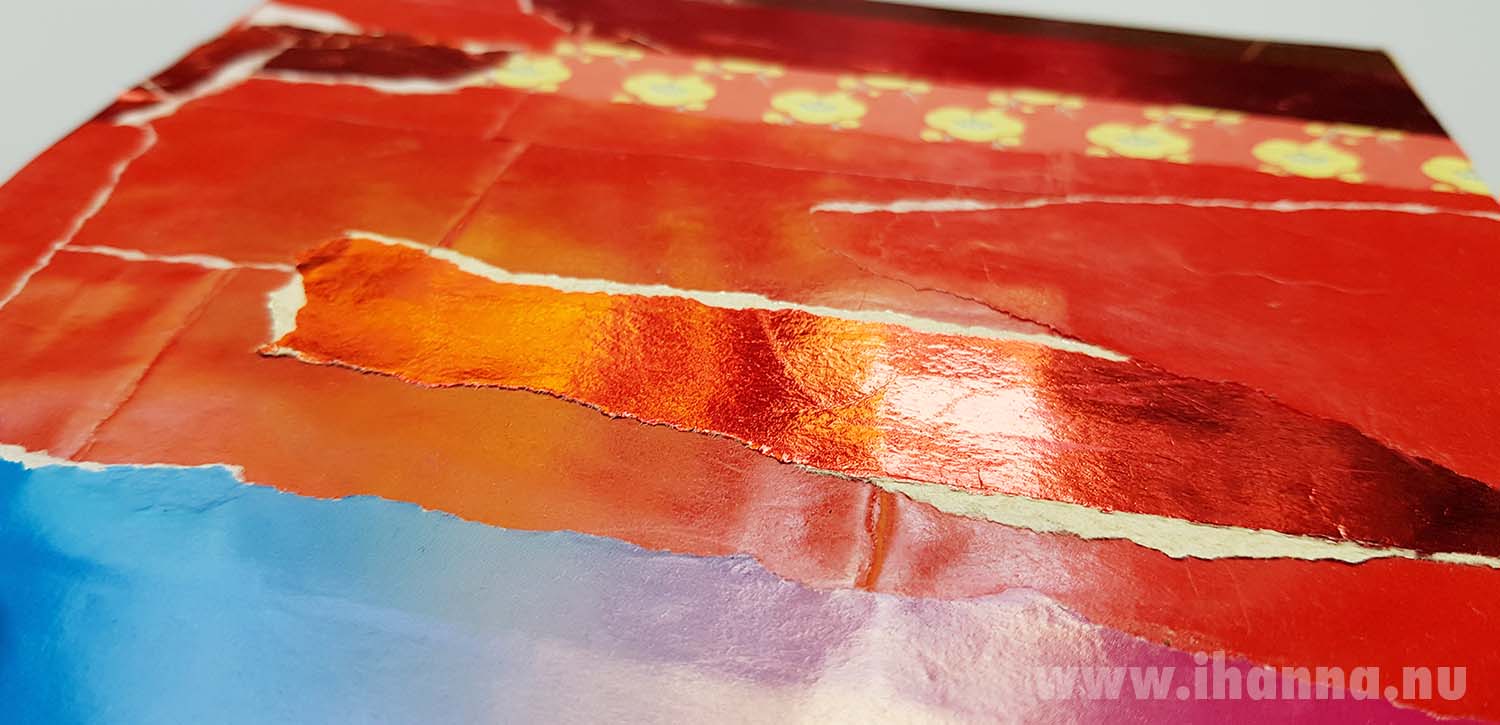 Showing the shine of one of the metallic red pieces in the kindergarten papers collages of week 20 2025 made by iHanna (Photo copyright H. Andersson 2025)