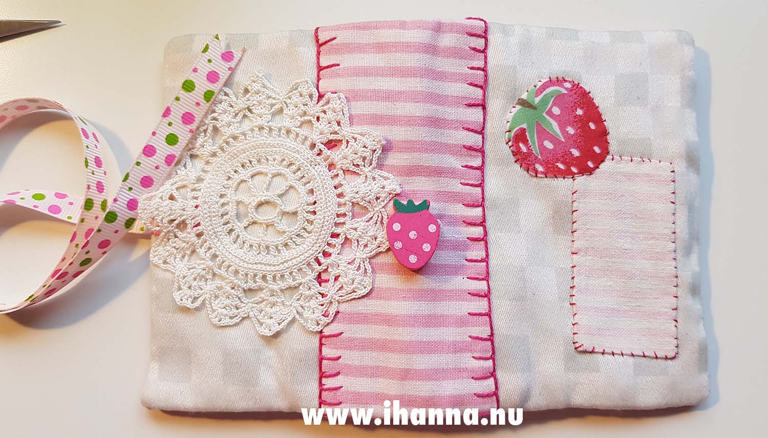World's Sweetest Needle book hand stitched by iHanna and decorated with strawberries (Photo copyright Hanna Andersson) 2025